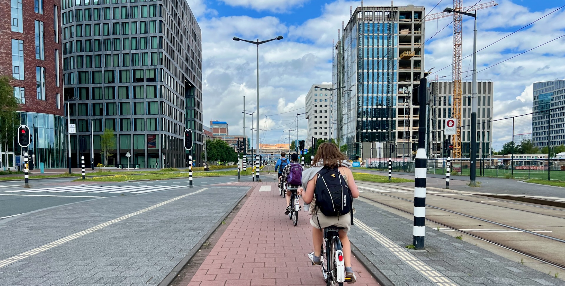 On bikes in a more modern district of the city.