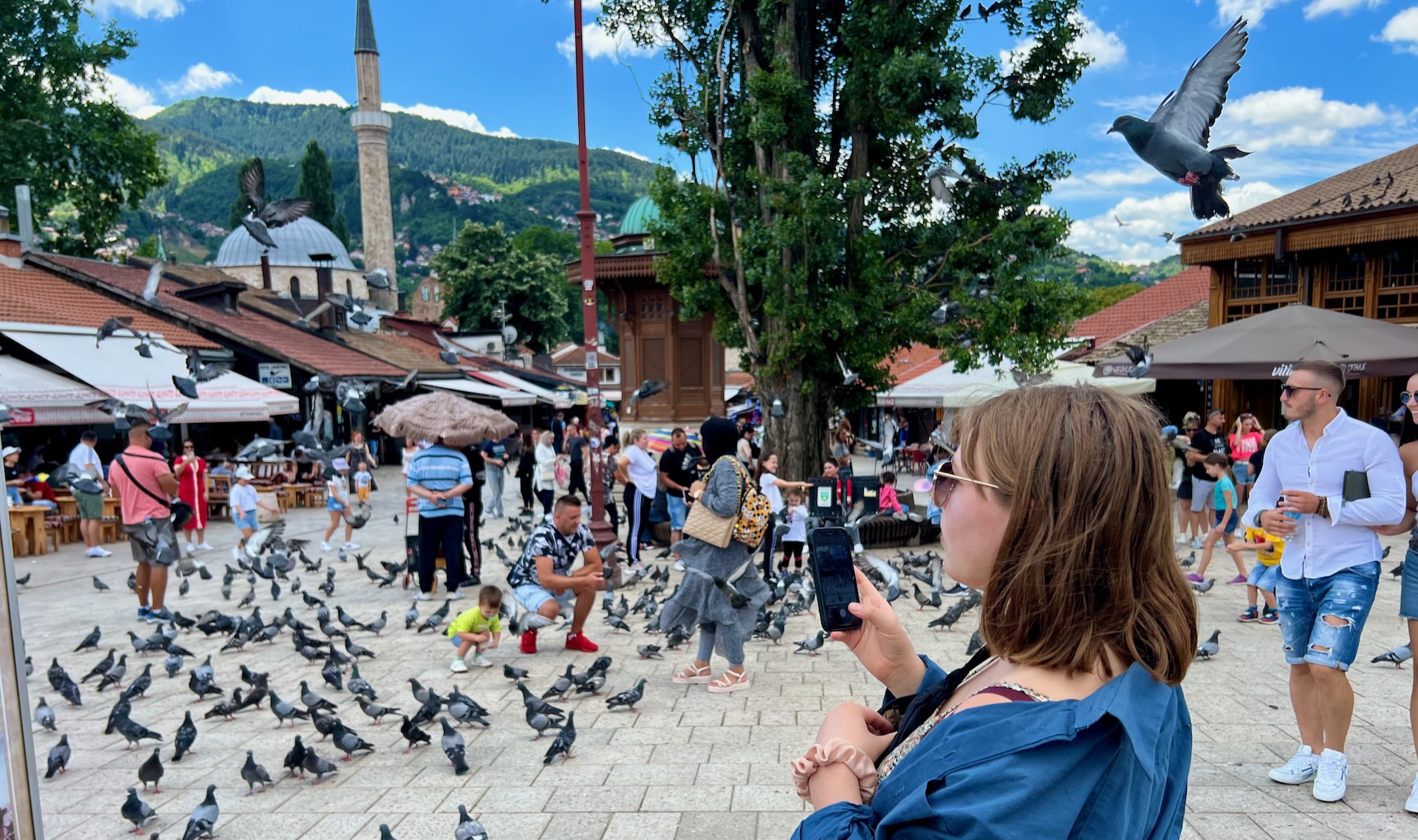 Sarajevo Old Town, with pigeons. You can see the Trebević mountains in the distance from this shot.